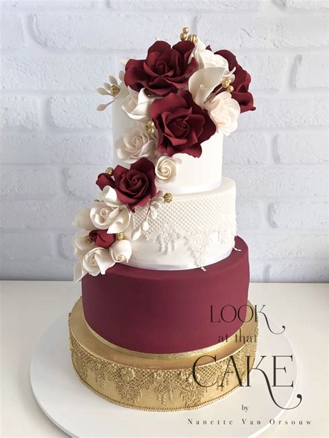 burgundy and gold rolex cakes|burgundy wedding cake with gold.